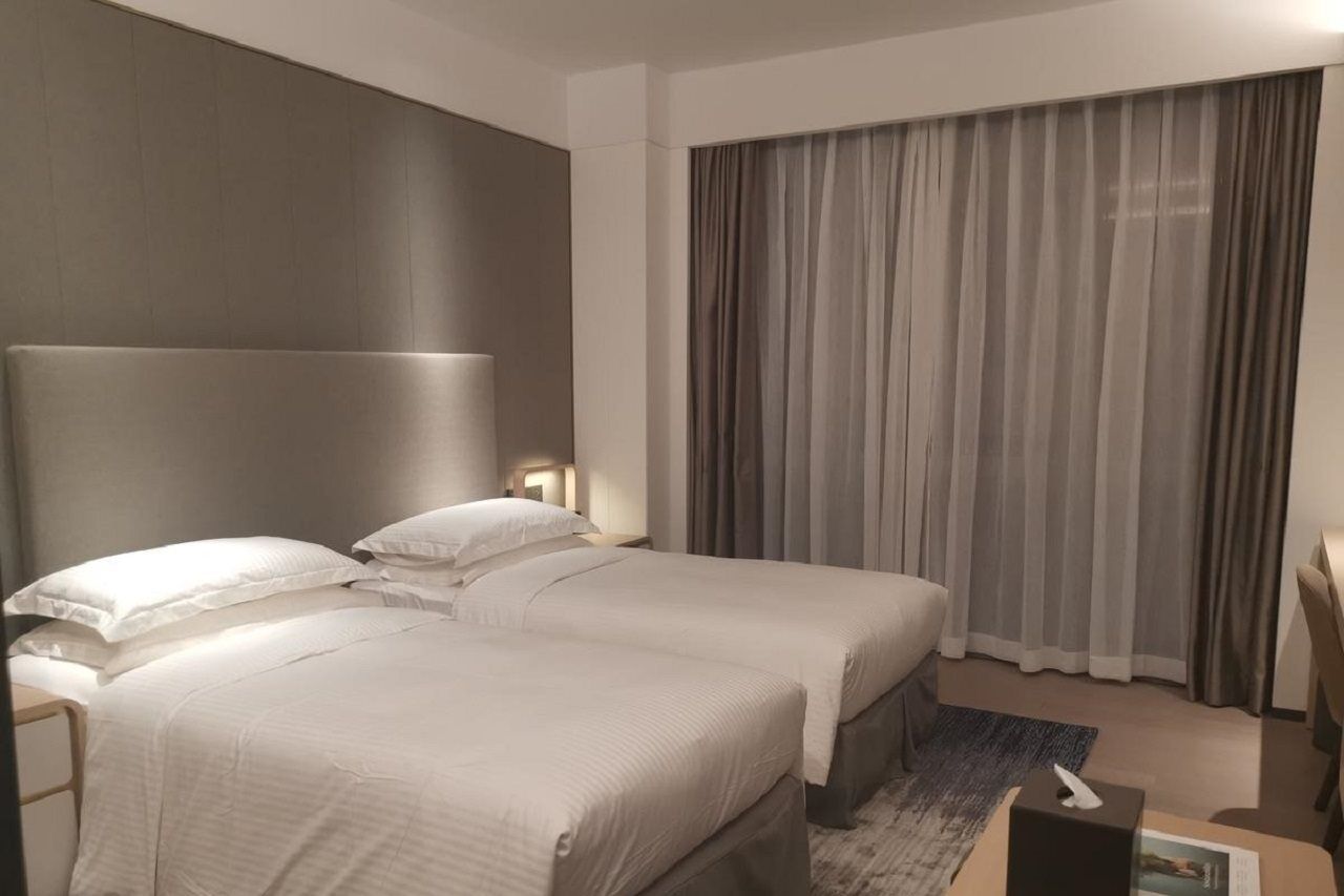 Ascott Raffles City Чунцин Экстерьер фото